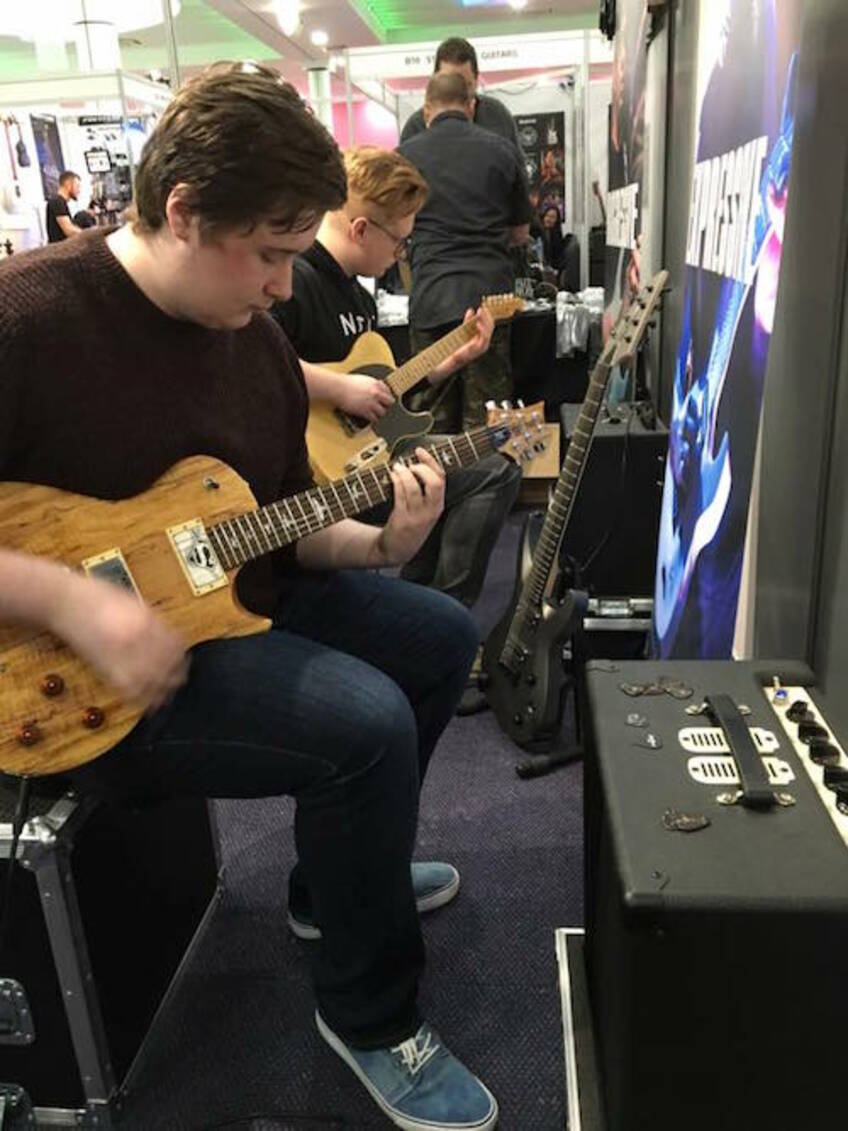Bare Knuckle players with our guitars at the Guitar Show UK